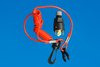 Kill switch with coil lanyard tether and plastic hook