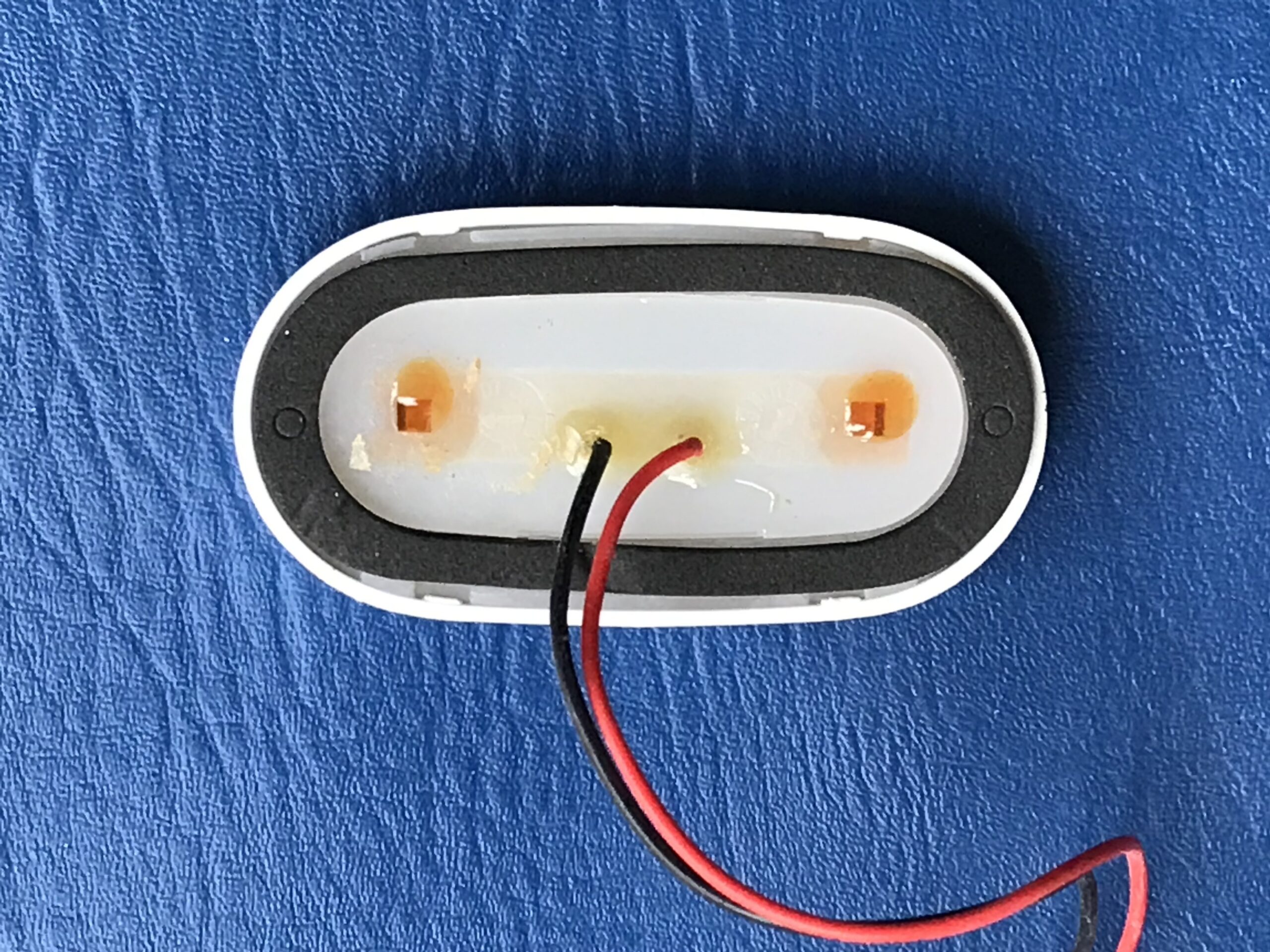LED Oval Courtesy Light - White Plastic Surround - Red LEDs - 12VDC - Image 2